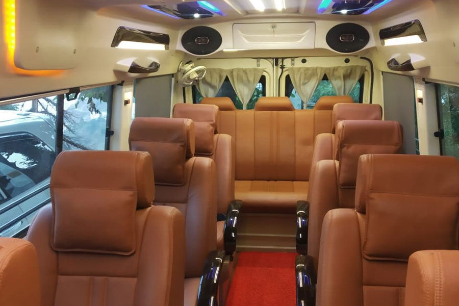 Unlocking Delhi’s Marvels: Embracing the Convenience of a 9-Seater Tempo Traveller in Delhi