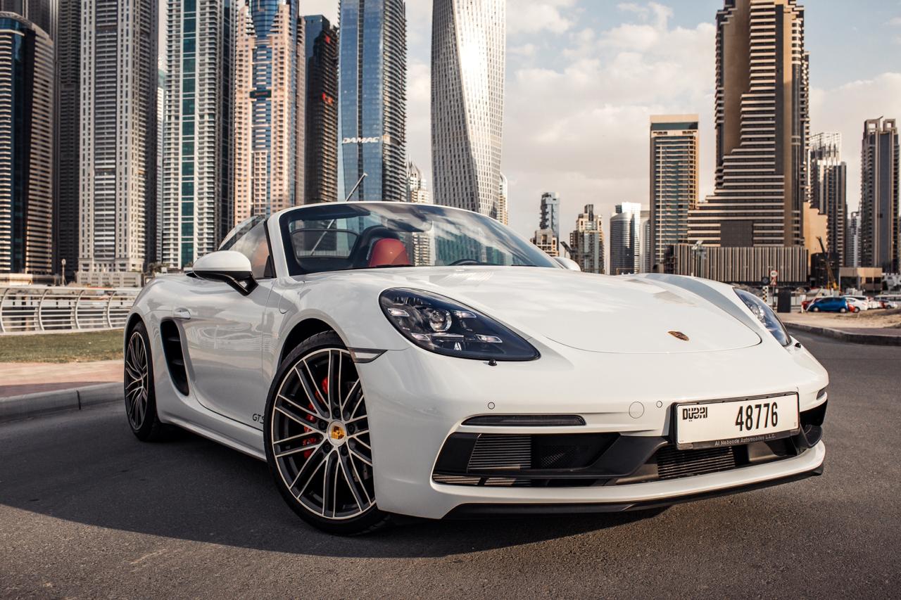 How can one navigate the process of renting a car in Dubai effectively
